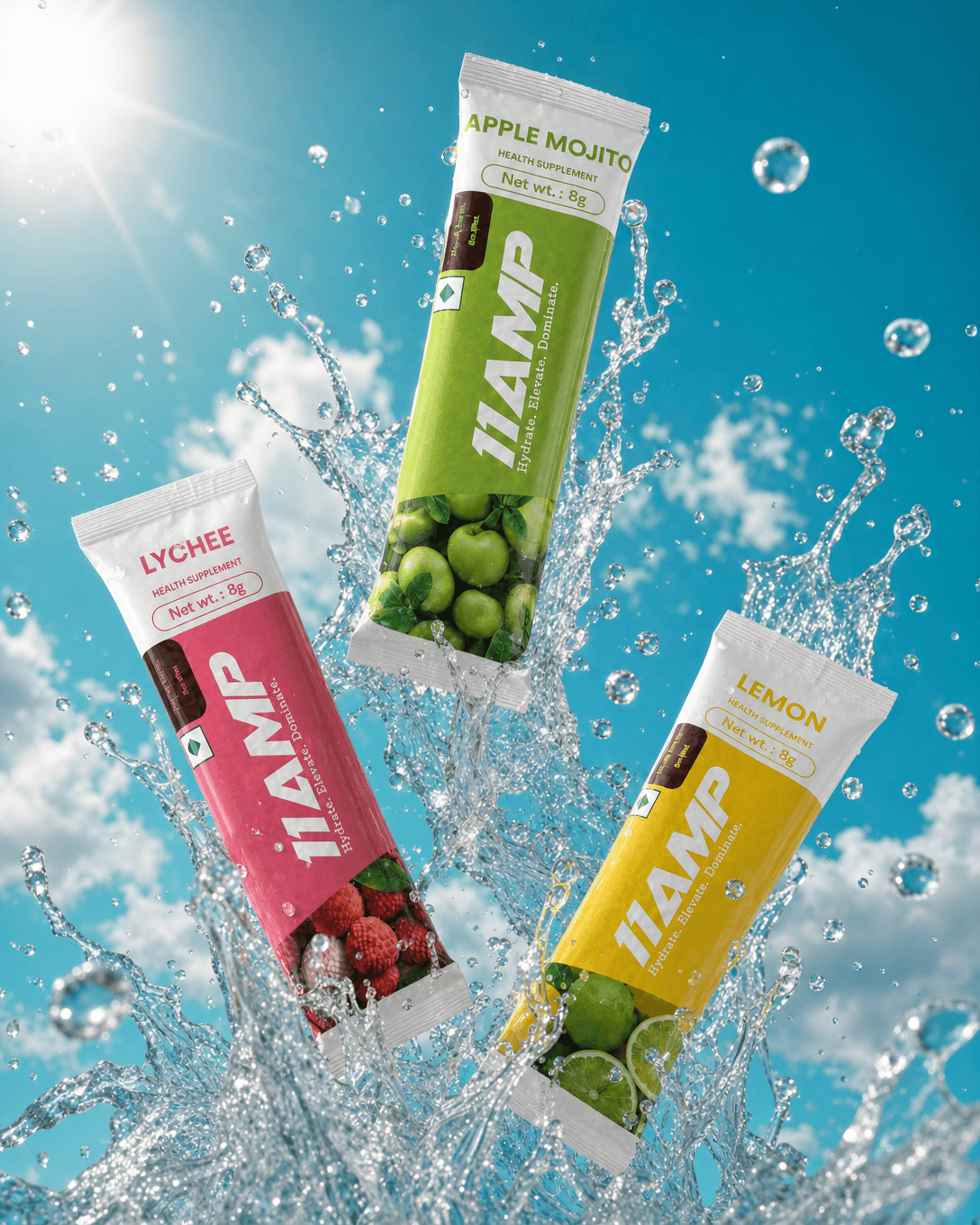 11AMP Lychee, Apple Mojito and Lemon sachets splashing through water under a blue sky